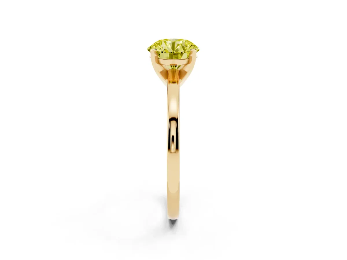 Fancy Yellow Round Cut Solitaire Diamond Engagement Ring with Four-Prong Setting on a Classic Band Yellow gold