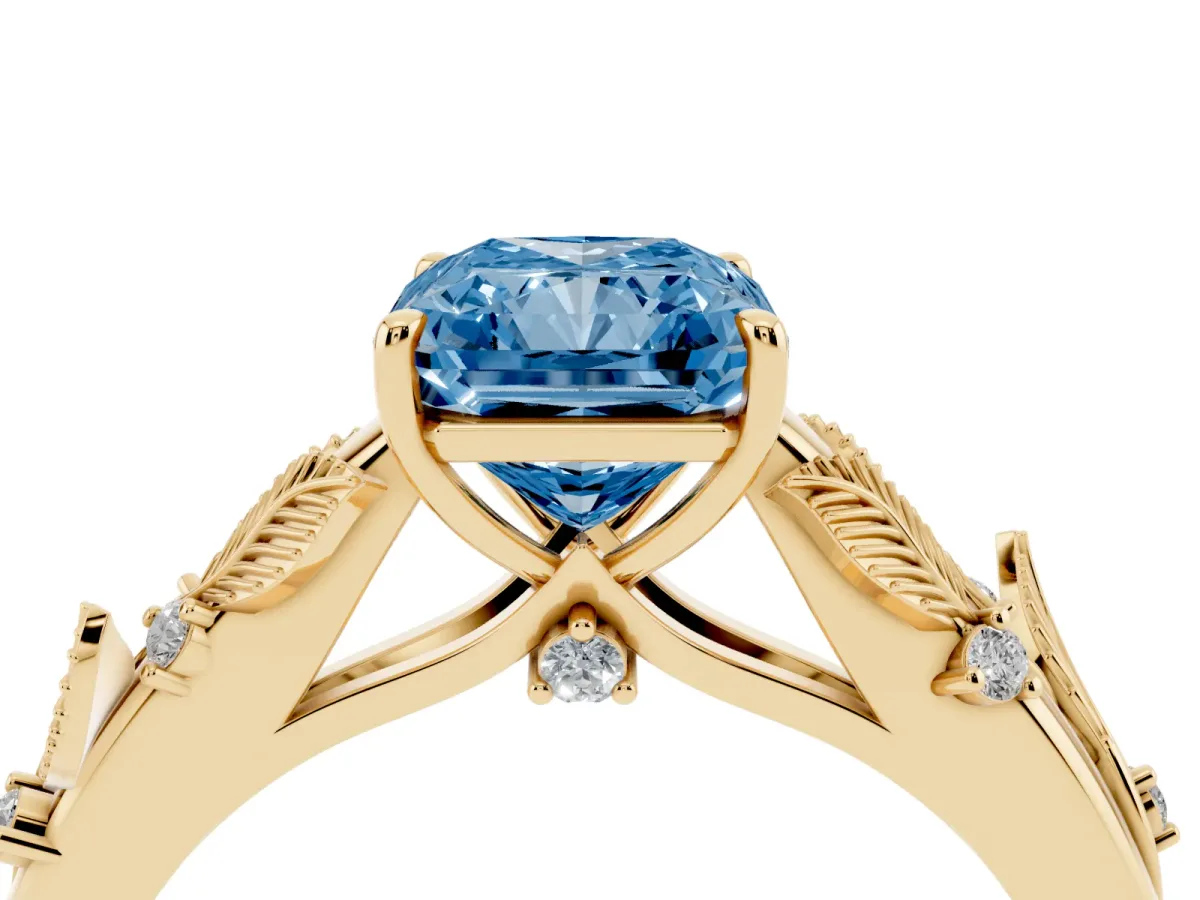 Fancy Blue Radiant Cut Diamond Solitaire Ring with Leaf Motif Band and Four-Prong Setting Yellow gold