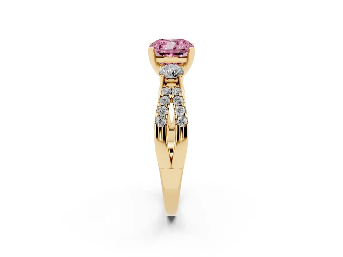 Fancy Pink Cushion Cut Diamond Three-Stone Ring with Pavé Split Shank and Four-Prong Setting Yellow gold
