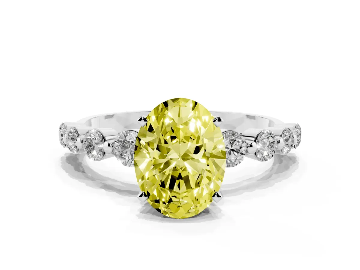 Fancy Yellow Oval Cut Solitaire Diamond Ring with Pave Band and Four-Prong Setting Silver
