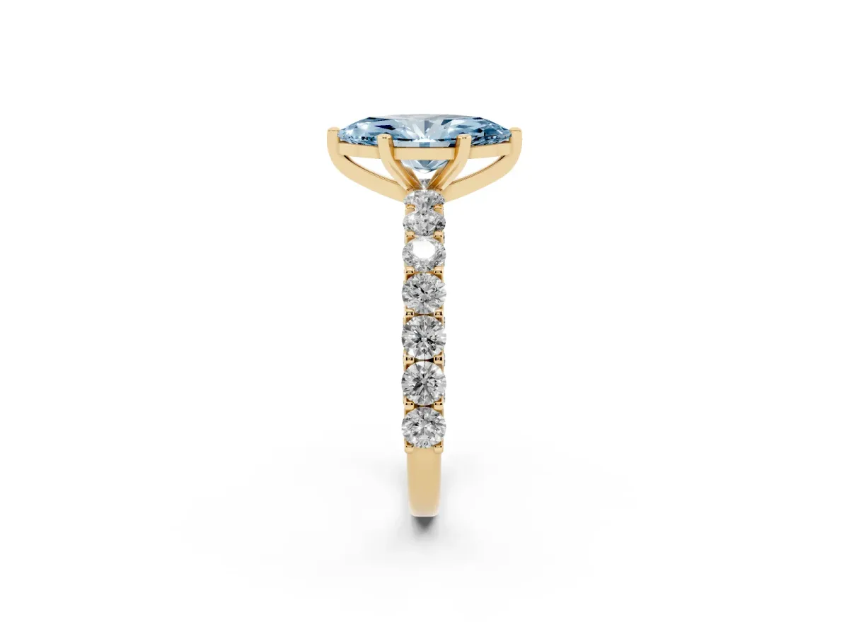 Fancy Blue Marquise Cut Diamond Solitaire Ring with Shared Prong Pavé Band and Four-Prong Setting Yellow gold
