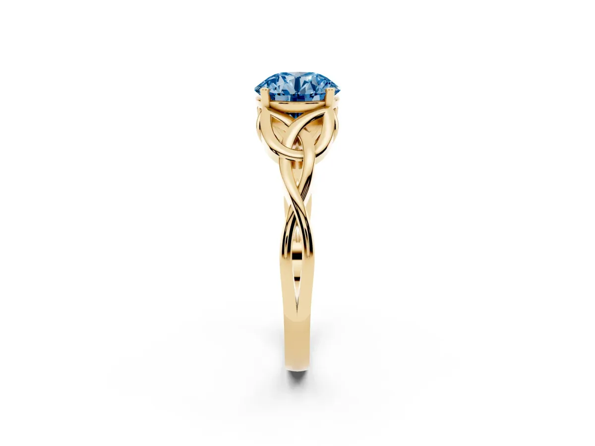 Fancy Blue Round Cut Diamond Solitaire Engagement Ring with Celtic Knot Band and Four-Prong Setting Yellow gold
