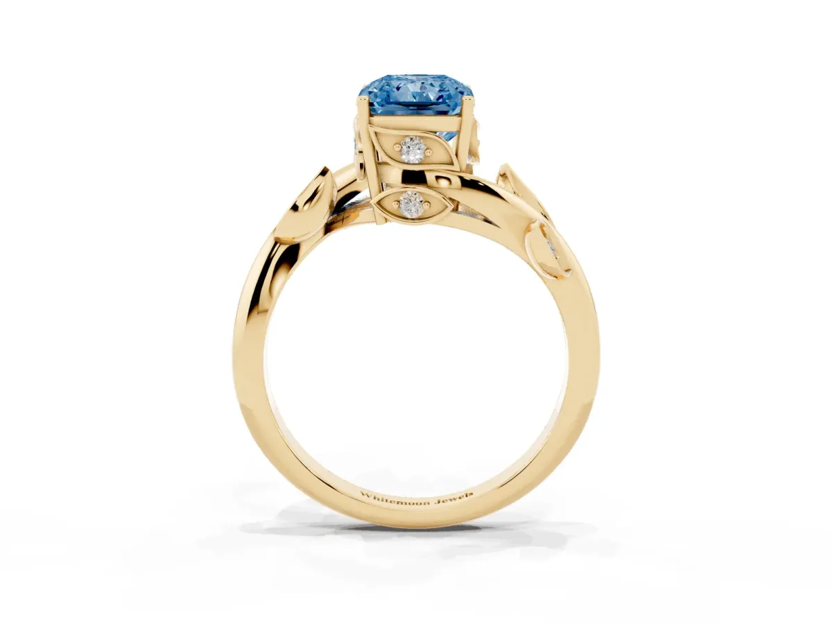 Fancy Blue Radiant Cut Solitaire Twist Engagement Ring with Leaf Accents and Prong Setting Yellow gold