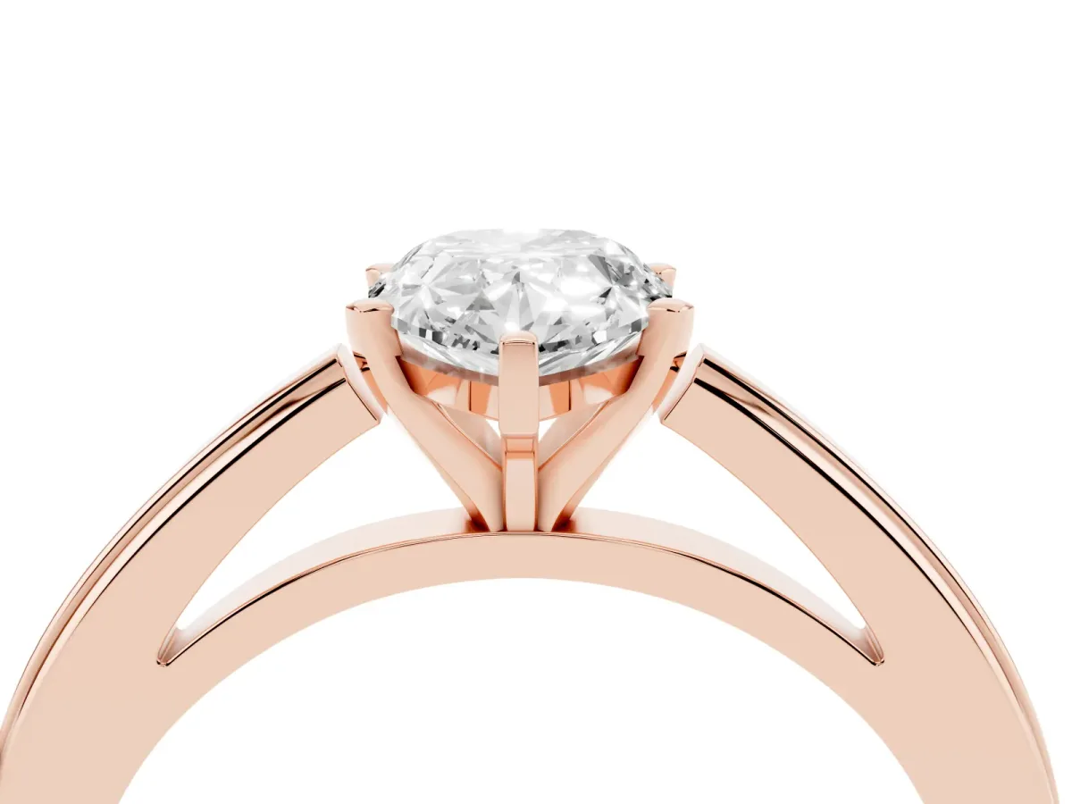 Pear Cut Solitaire Diamond Ring with Four-Prong Setting and Classic Band Rose gold