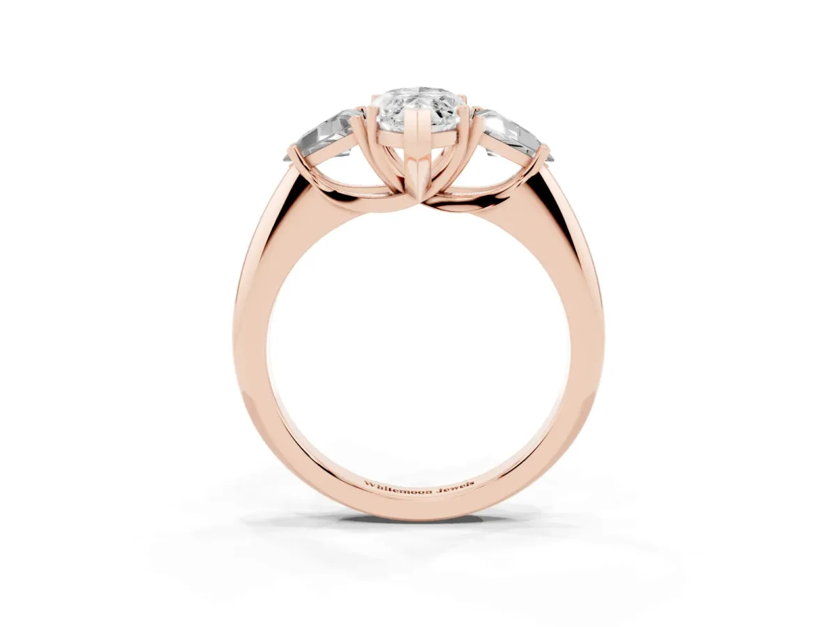 Three-Stone Marquise Cut Diamond Engagement Ring with Trillion Side Stones and Prong Setting Rose gold