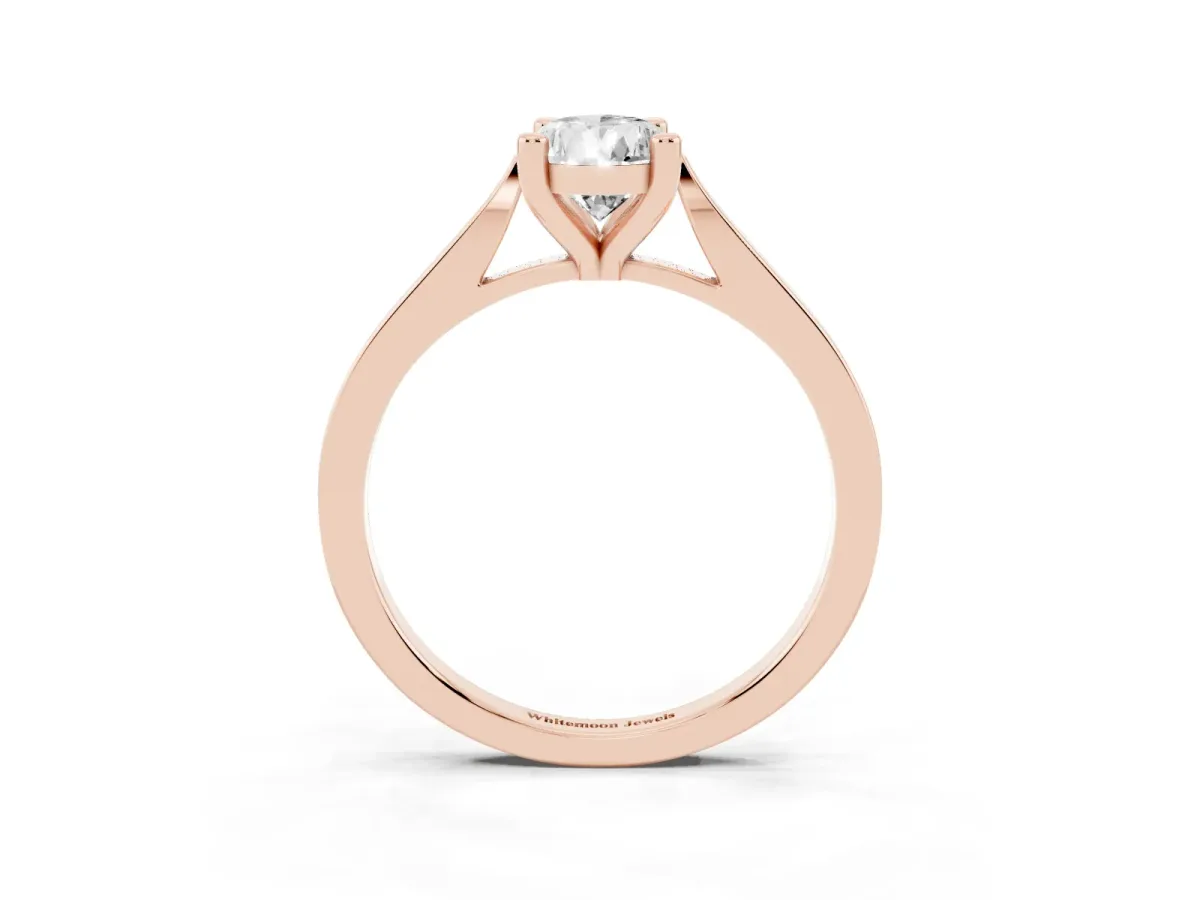 Pear Cut Solitaire Diamond Ring with Four-Prong Setting and Tapered Band Rose gold