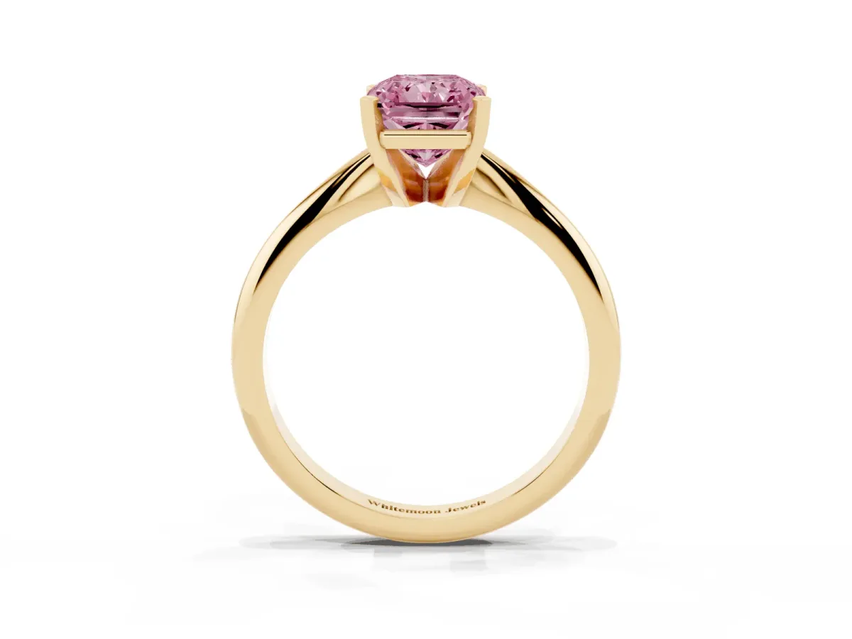 Fancy Pink Radiant Cut Cut Solitaire Ring with Four-Prong Setting on a Classic Band Yellow gold