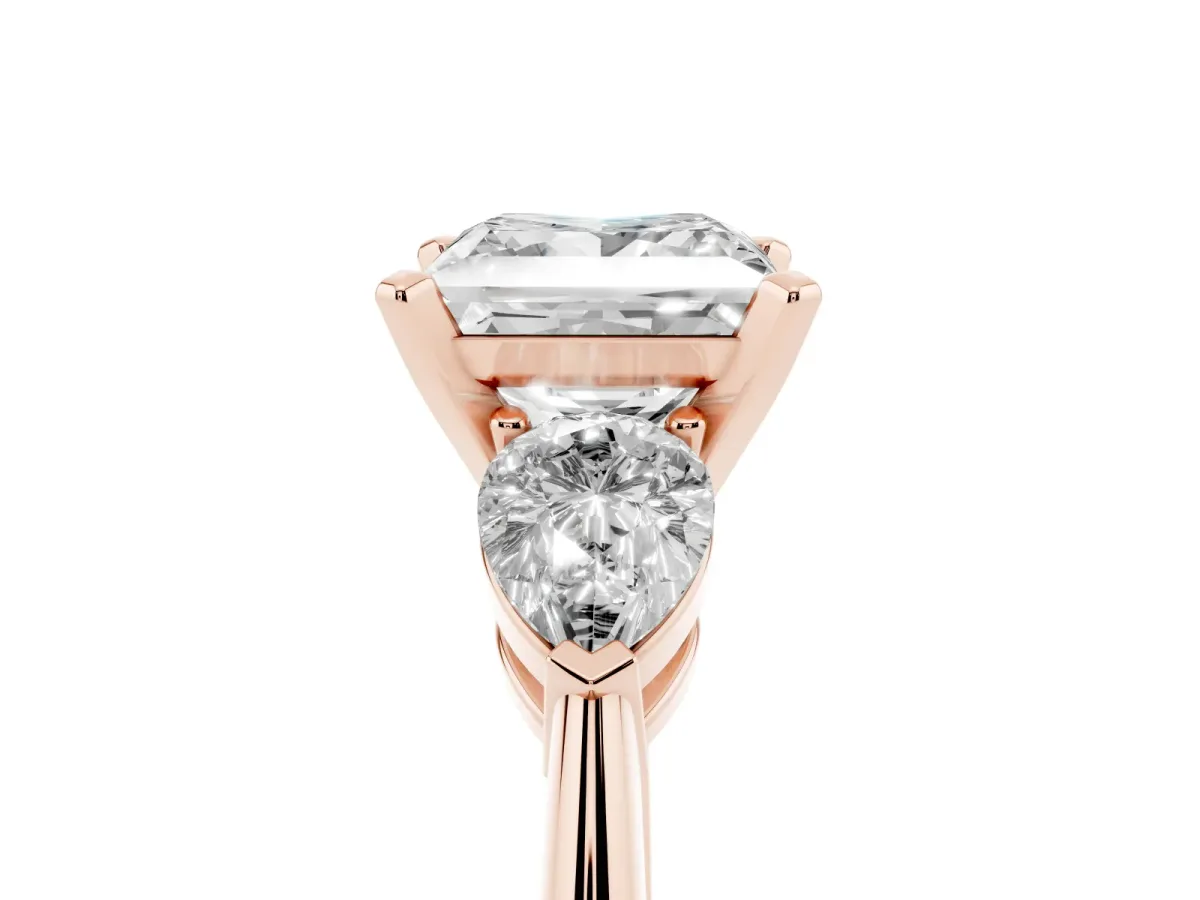 Three-Stone Princess Cut Diamond Ring with Pear Side Stones and Four-Prong Setting Rose gold