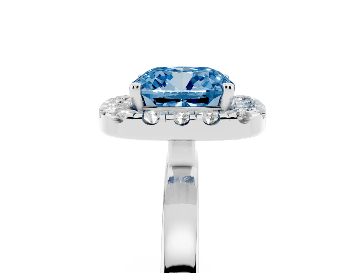 Fancy Blue Cushion Cut Halo Diamond Solitaire with Pavé Band and Four-Prong Setting Silver