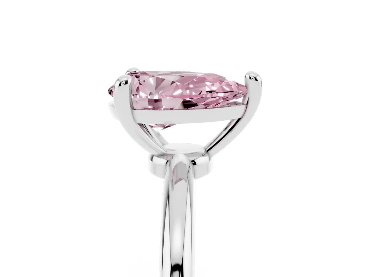 Fancy Pink Pear Cut Solitaire Diamond Ring with 4-Prong Setting on a Classic Band Silver