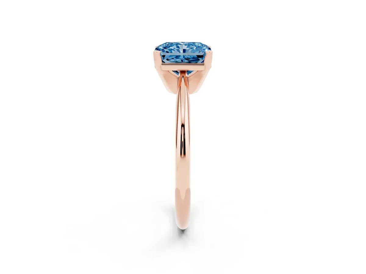 Fancy Blue Radiant Cut Cut Solitaire Ring with Four-Prong Setting on a Classic Band Rose gold