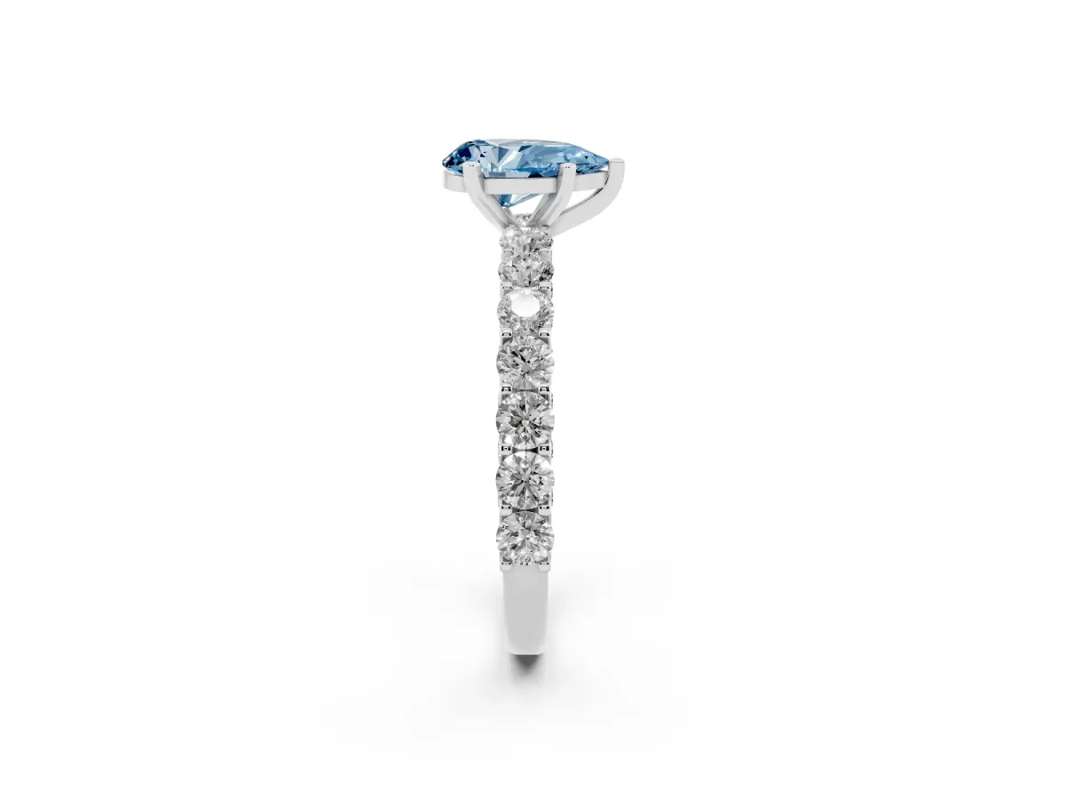 Fancy Blue Pear Cut Diamond Solitaire Ring with Shared Prong Pavé Band and Four-Prong Setting Silver
