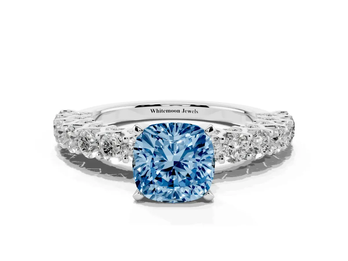 Fancy Blue Cushion Cut Diamond Solitaire Ring with Shared Prong Pavé Band and Four-Prong Setting Silver