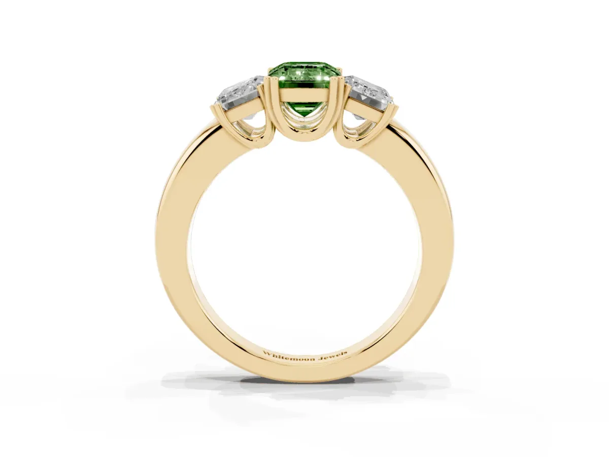 Fancy Green Three-Stone Emerald Cut Cut Diamond Ring with Channel Set Band and Four-Prong Setting Yellow gold