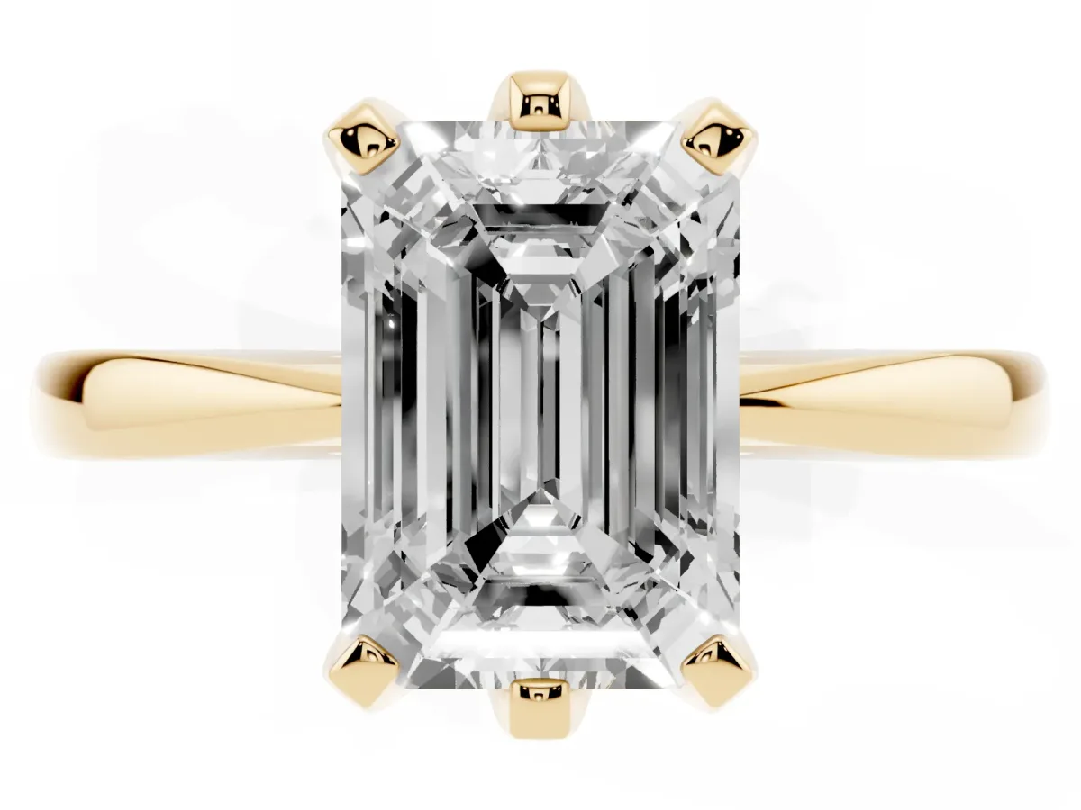 Emerald Cut Solitaire Engagement Ring with Six-Prong Setting and Tapered Band Yellow gold