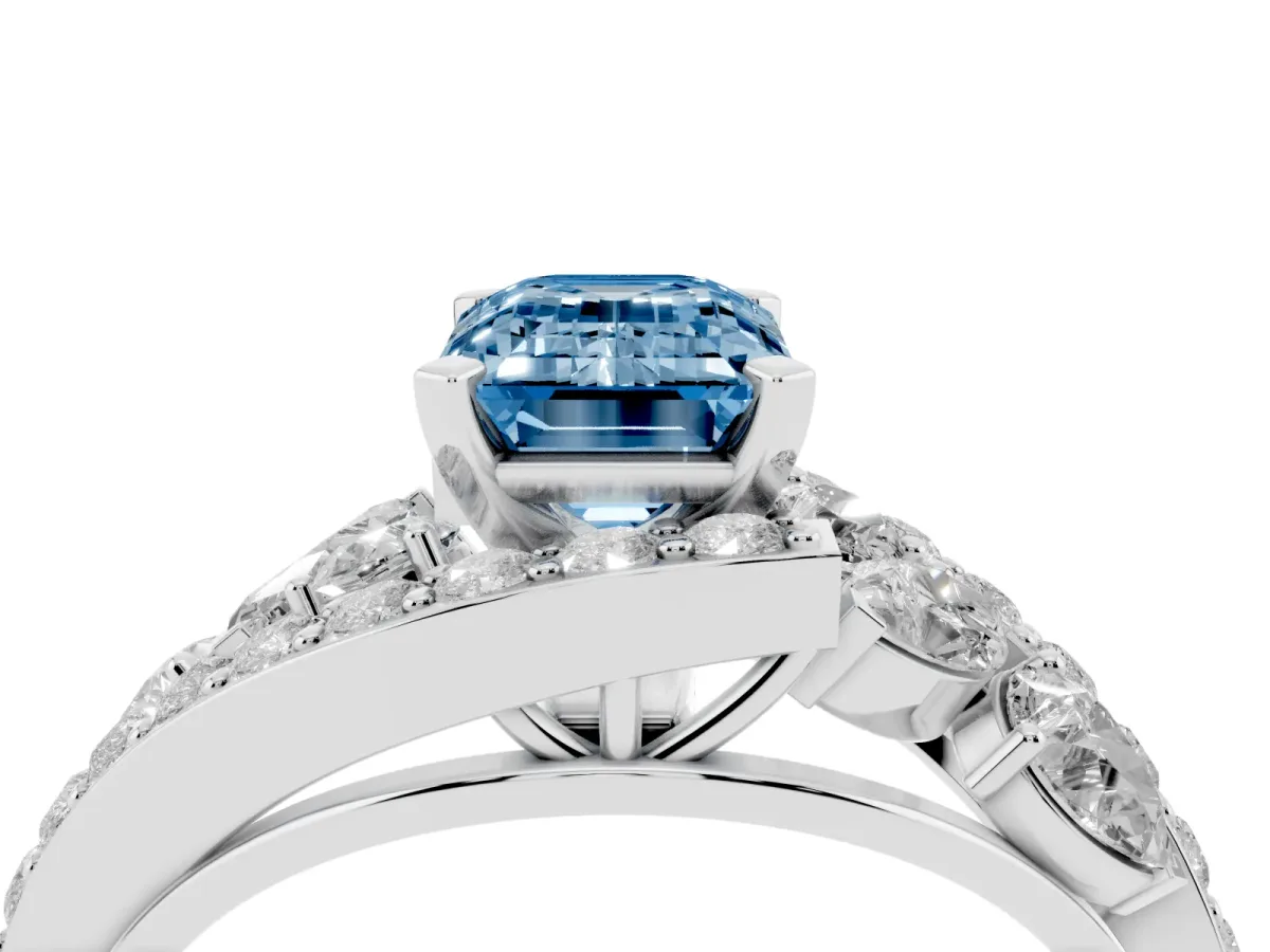Fancy Blue Emerald Cut Diamond Halo Ring with Marquise and Pavé Band in Prong Setting White gold