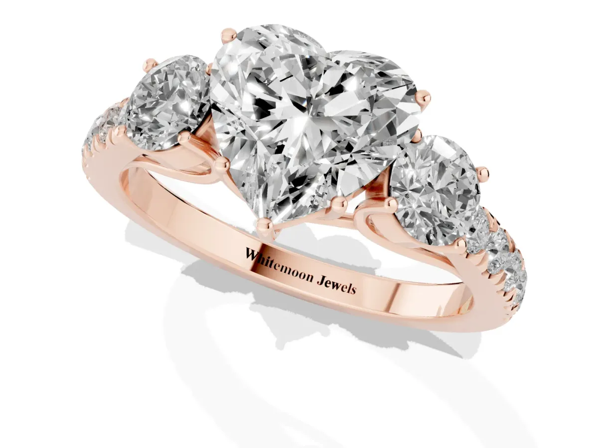 Heart Cut Cut Diamond Three-Stone Ring with Round Side Stones and Pavé Band Rose gold