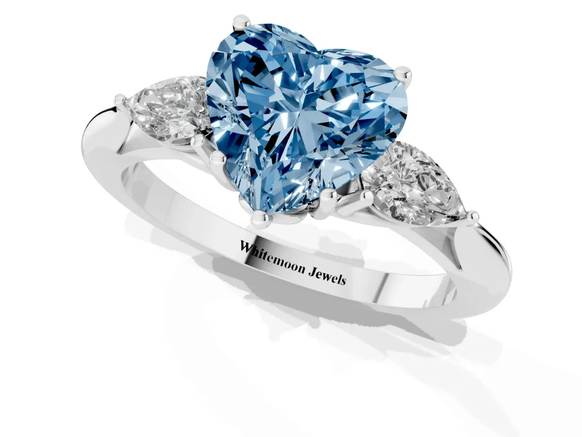 Fancy Blue Heart Cut Diamond Three-Stone Ring with Pear Side Stones and Prong Setting Silver