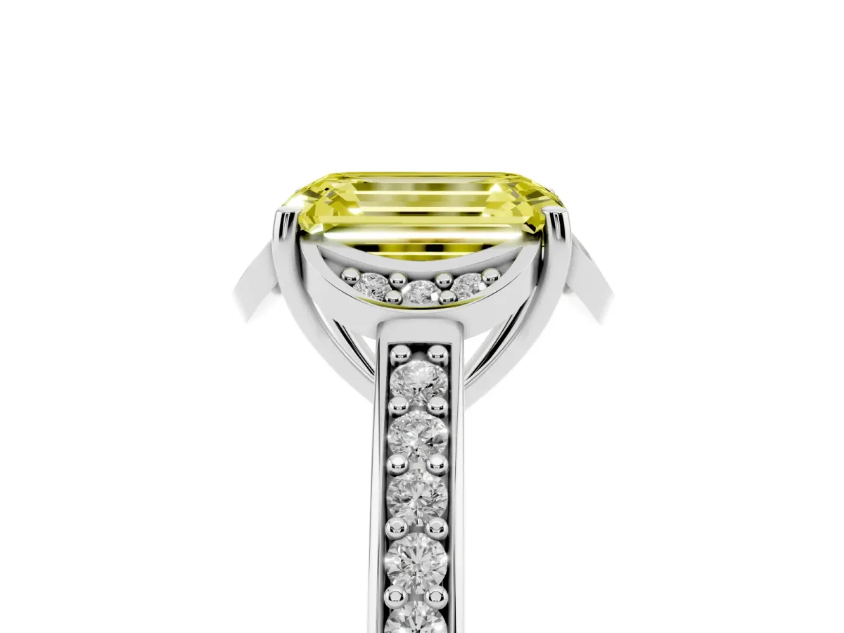 Fancy Yellow Emerald Cut Cut Halo Diamond Ring with Channel Set Band and Four-Prong Setting White gold