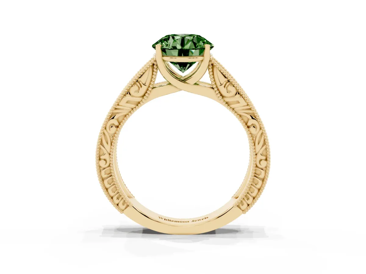 Fancy Green Round Cut Diamond Solitaire Ring with Engraved Band and Four-Prong Setting Yellow gold