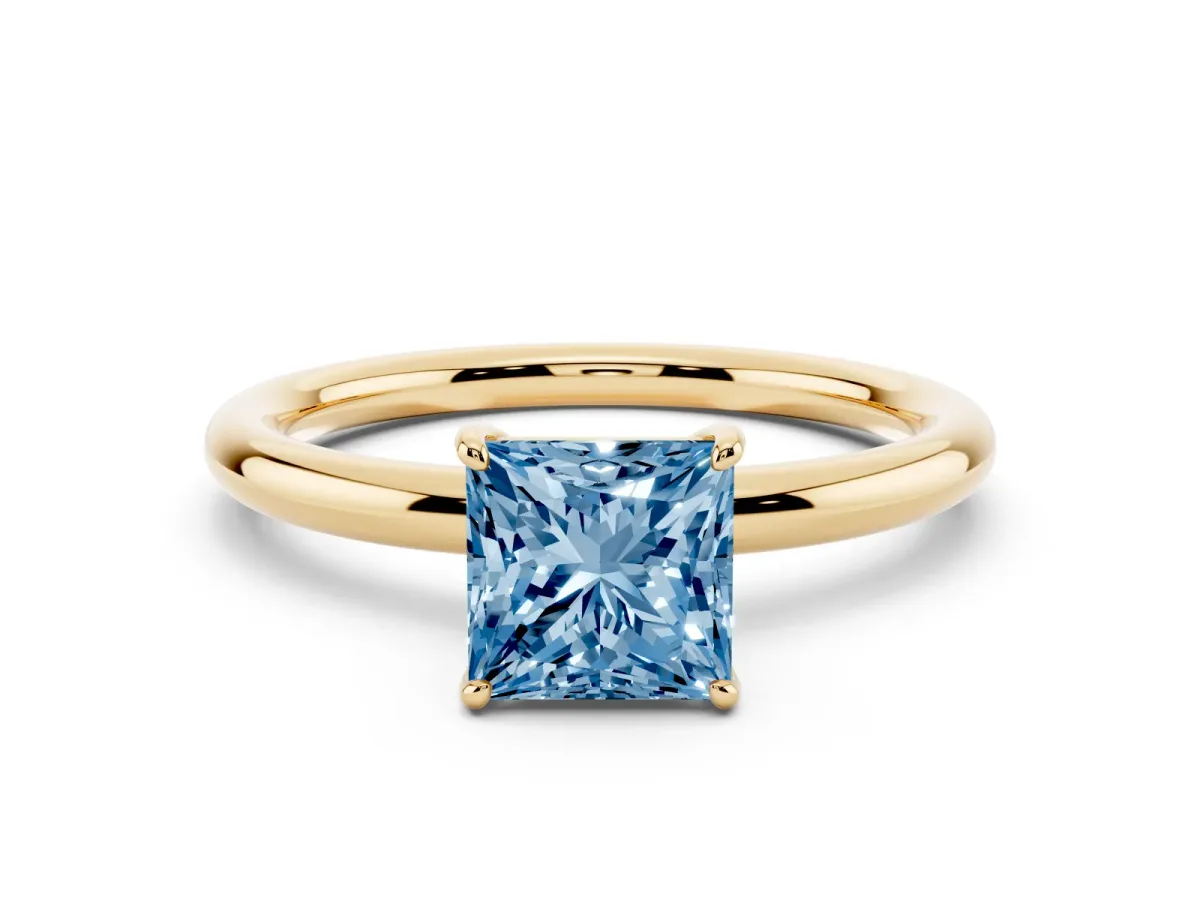 Fancy Blue Princess Cut Solitaire Diamond Ring with Four-Prong Setting on a Plain Band Yellow gold