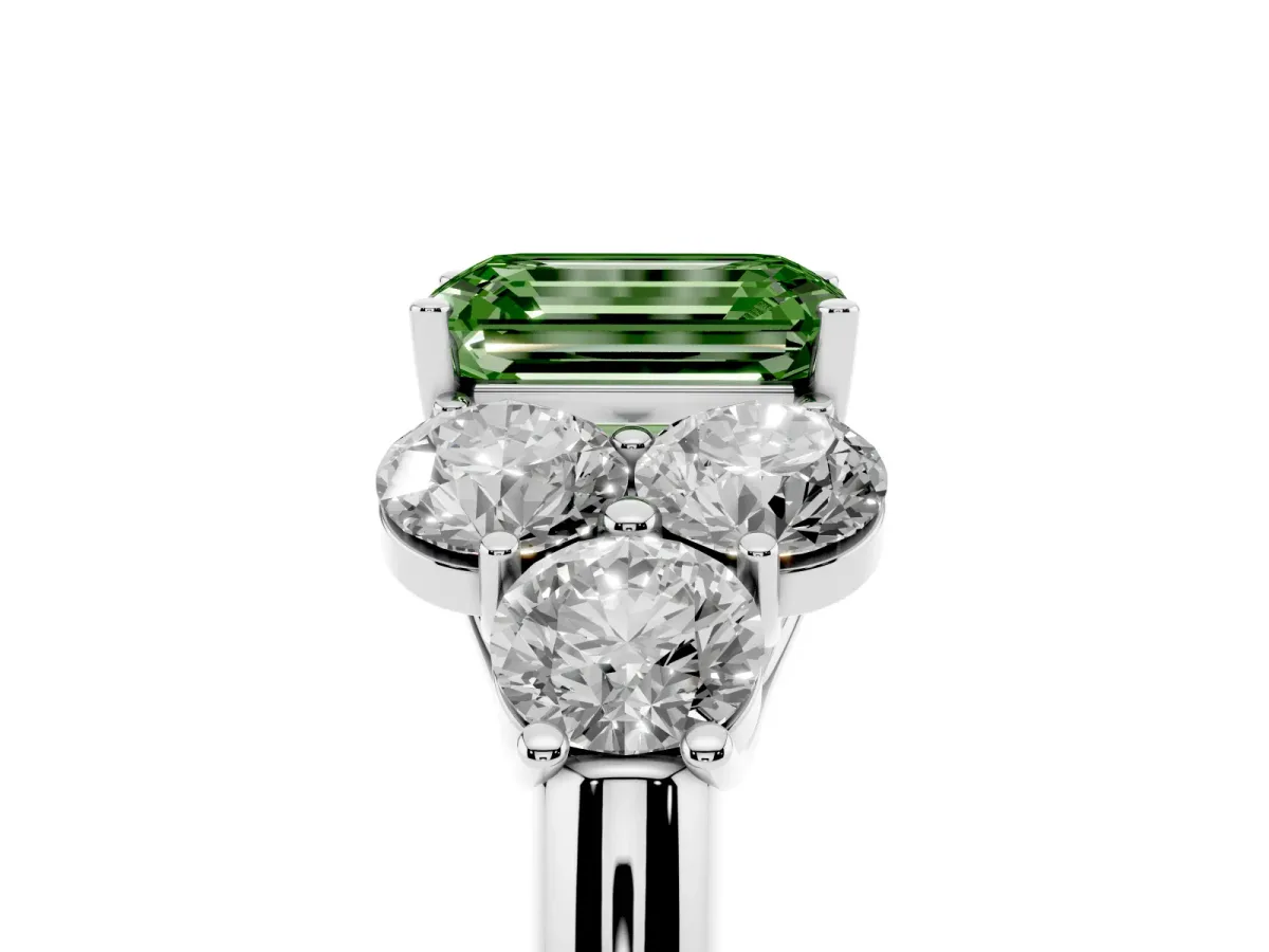 Fancy Green Emerald Cut Cut Diamond Cluster Ring with Round Accent Stones and Prong Setting on a Classic Band White gold
