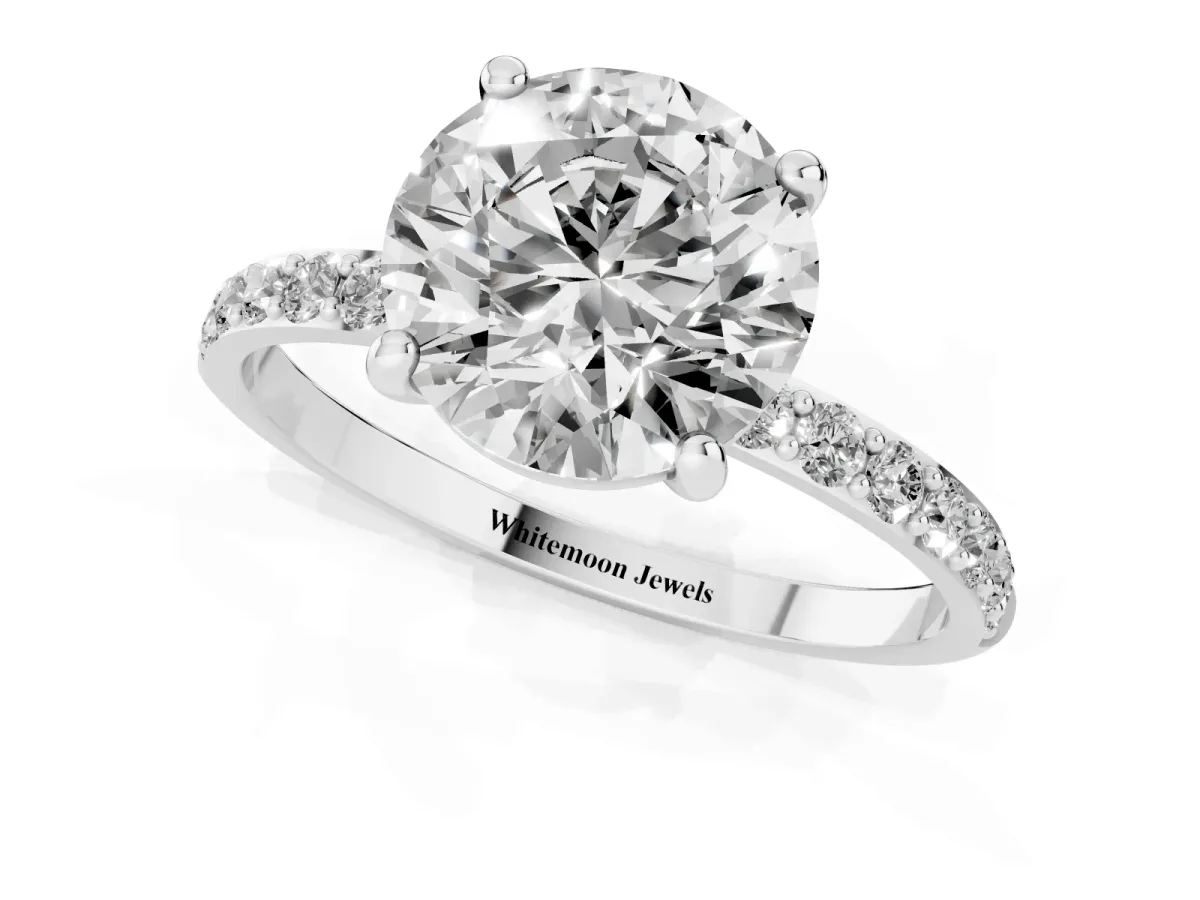 Round Cut Diamond Solitaire Ring with Round Pavé Band and Prong Setting Platinum