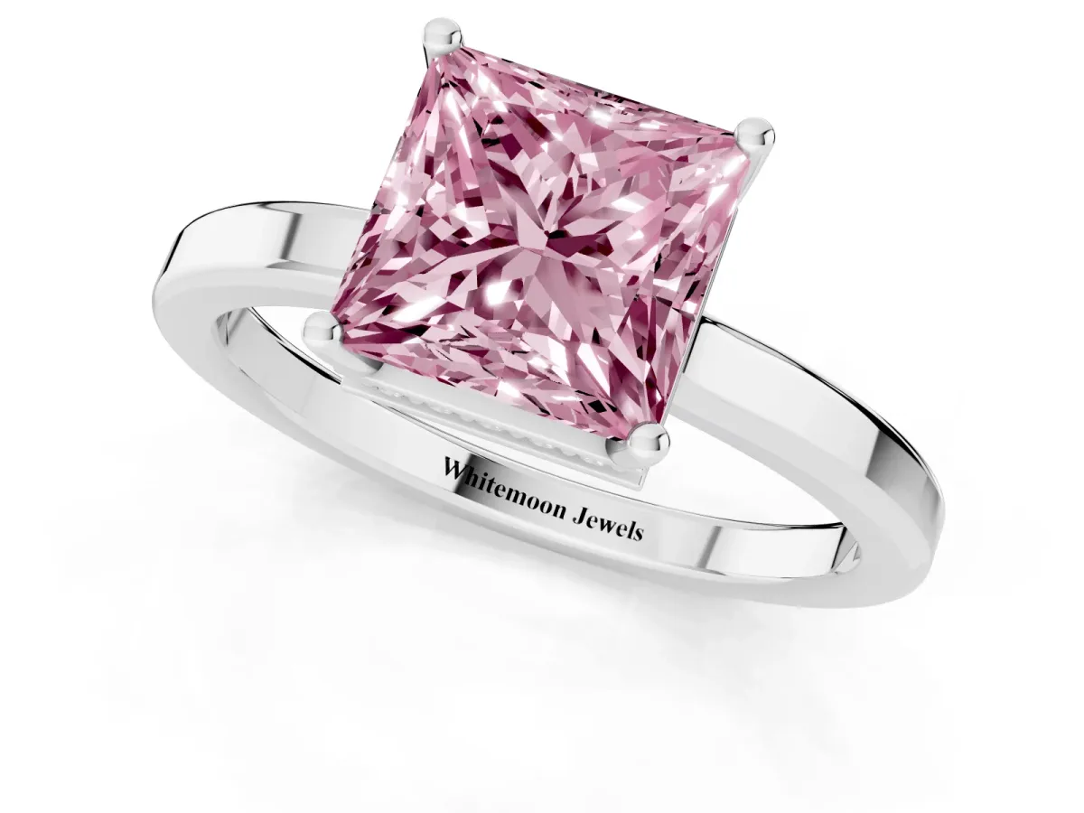 Fancy Pink Princess Cut Cut Solitaire Engagement Ring with Four-Prong Setting on a Classic Band Silver