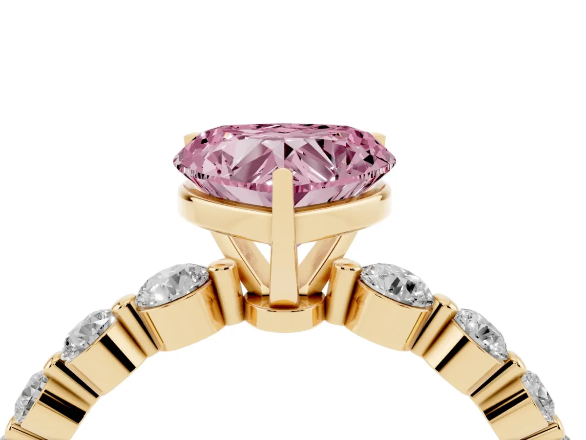 Fancy Pink Heart Cut Solitaire Diamond Ring with Pave Band and Four-Prong Setting Yellow gold