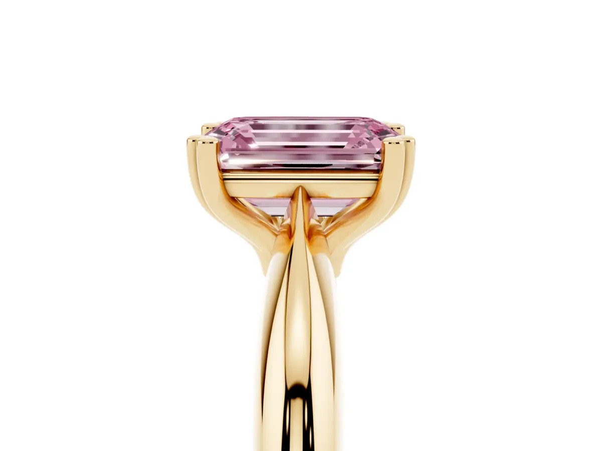 Fancy Pink Emerald Cut Cut Solitaire Engagement Ring with Tapered Band and Four-Prong Setting Yellow gold