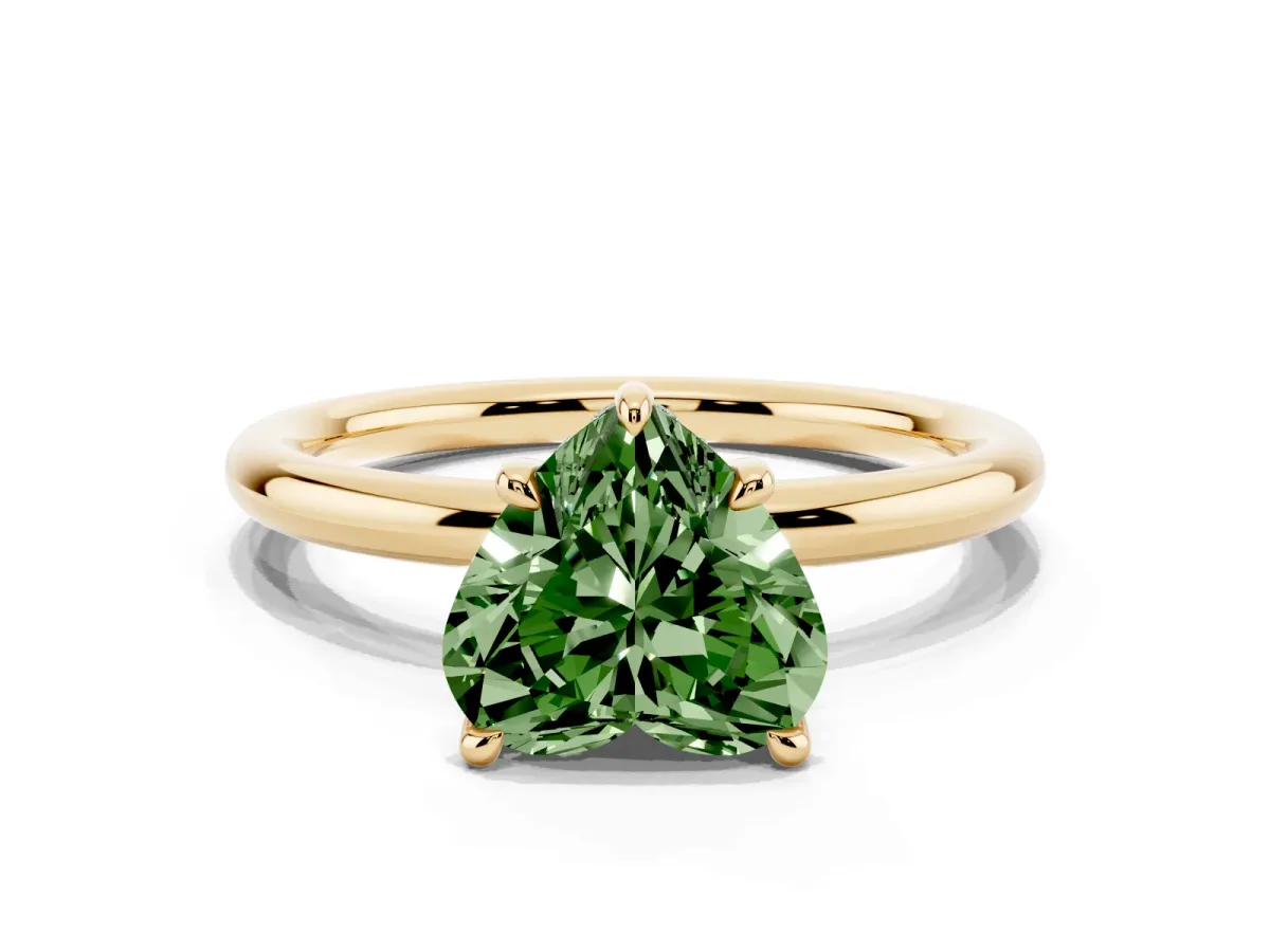 Fancy Green Heart Cut Diamond Solitaire Ring with Thin Band and Four-Prong Setting Yellow gold