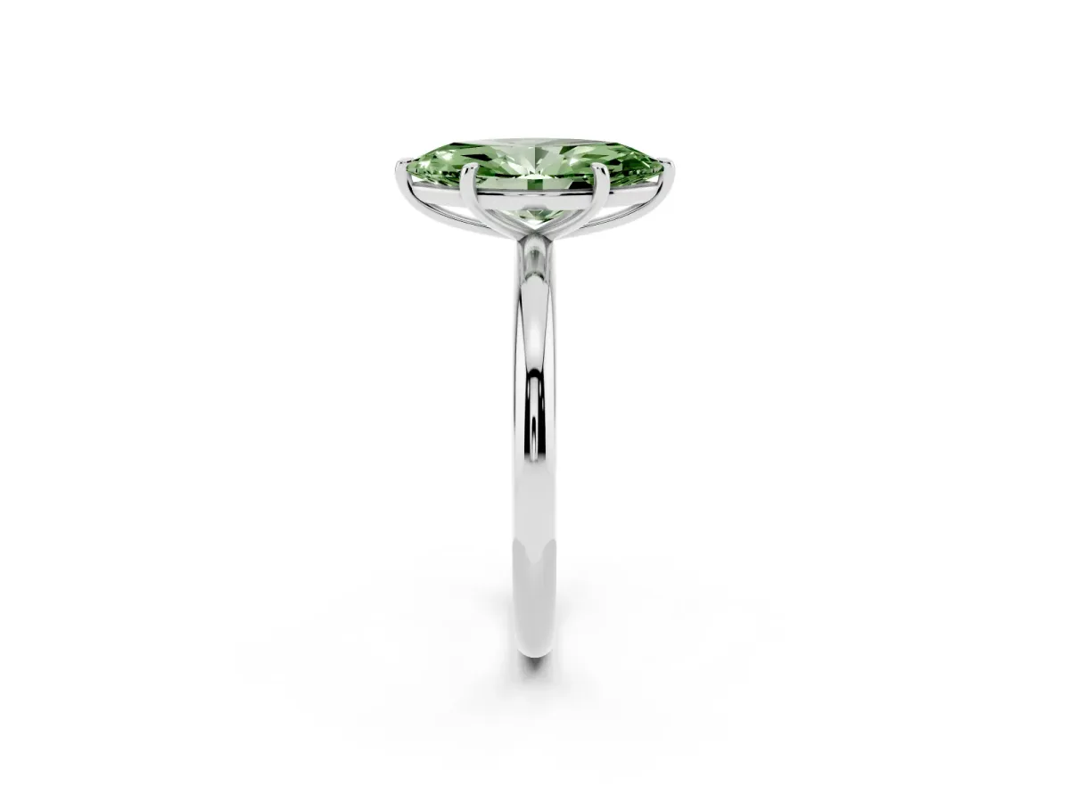 Fancy Green Marquise Cut Solitaire Diamond Ring with Four-Prong Setting on a Plain Band Silver