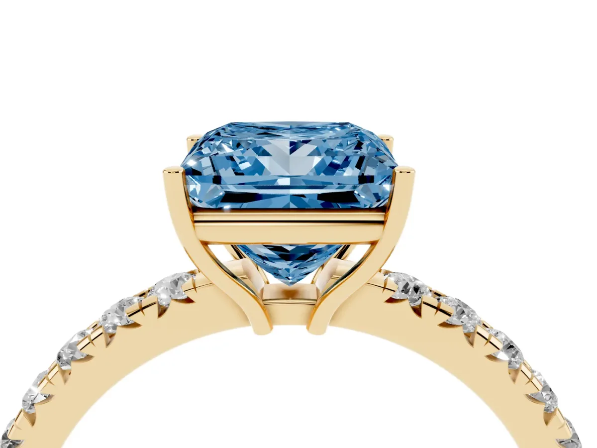 Fancy Blue Princess Cut Diamond Pavé Solitaire Engagement Ring with Four-Prong Setting Yellow gold