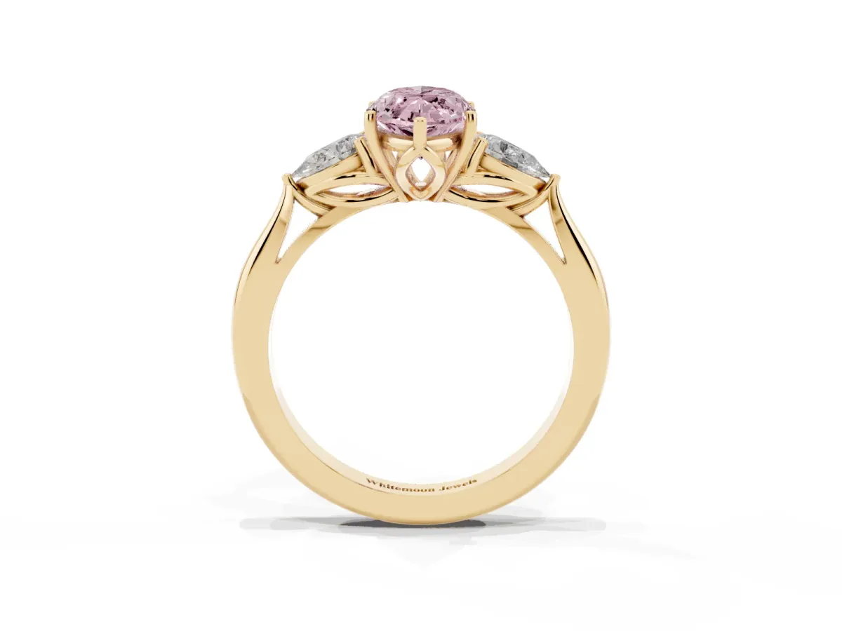 Fancy Pink Three-Stone Marquise Cut Brilliant Diamond Solitaire Ring with Tapered Band and Four-Prong Setting Yellow gold
