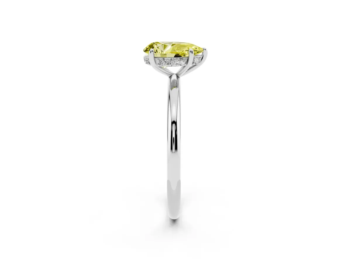 Fancy Yellow Pear Cut Solitaire Diamond Ring with a Classic Band and Four-Prong Setting Silver