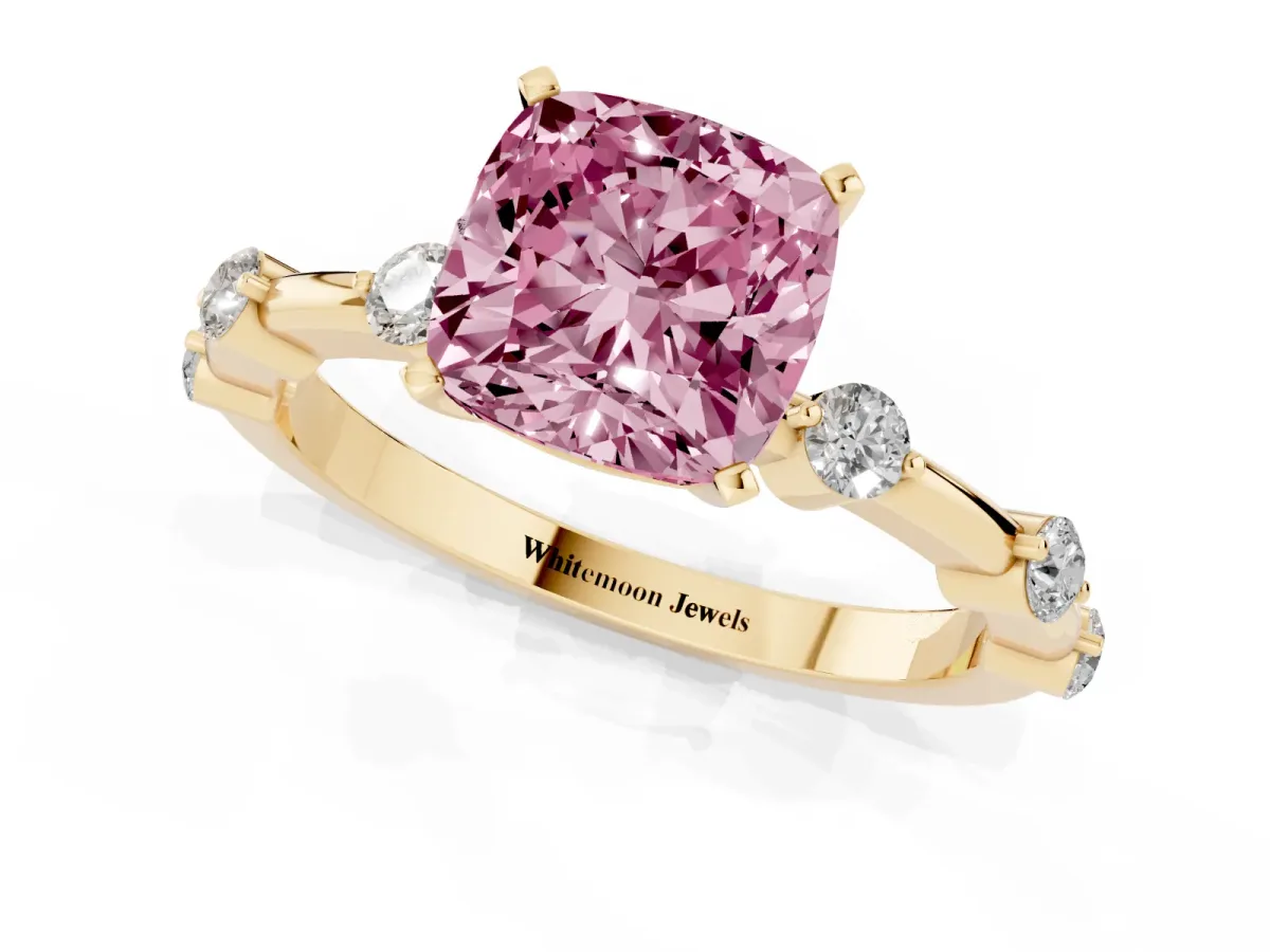 Fancy Pink Cushion Cut Solitaire Diamond Ring with Bezel Set Side Stones and Prong Setting Yellow gold