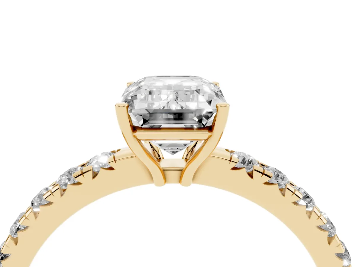 Emerald Cut Diamond Pavé Solitaire Engagement Ring with Four-Prong Setting Yellow gold