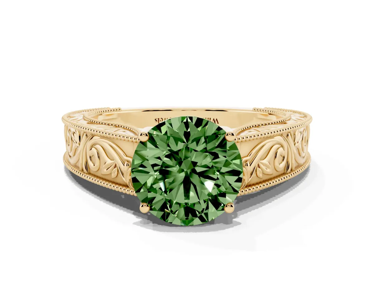 Fancy Green Round Cut Diamond Solitaire Ring with Engraved Band and Four-Prong Setting Yellow gold