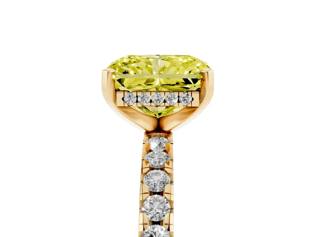 Fancy Yellow Radiant Cut Diamond Solitaire Ring with Round Pavé Band and Four-Prong Setting Yellow gold
