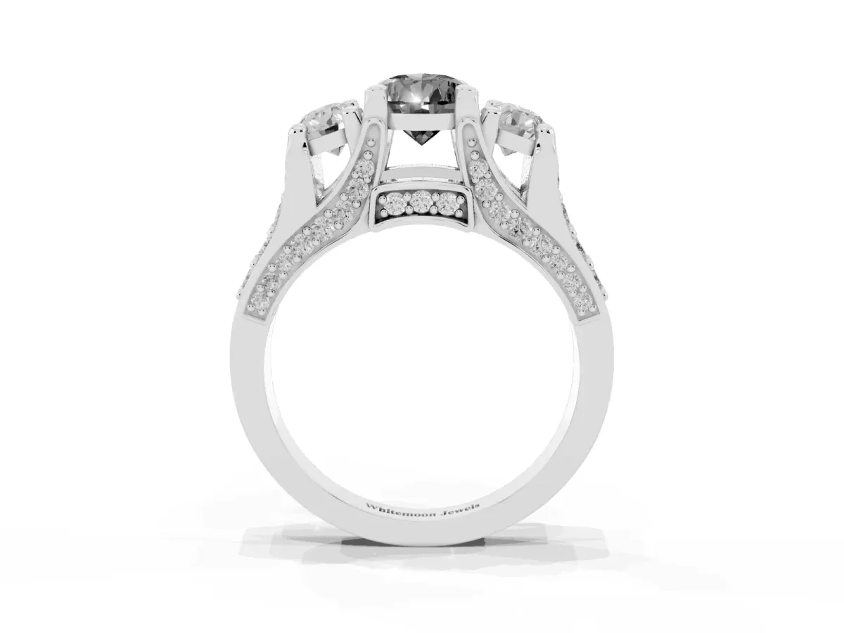 Fancy Black Pear Cut Diamond Three-Stone Ring with Channel Set Band and Four-Prong Setting Silver