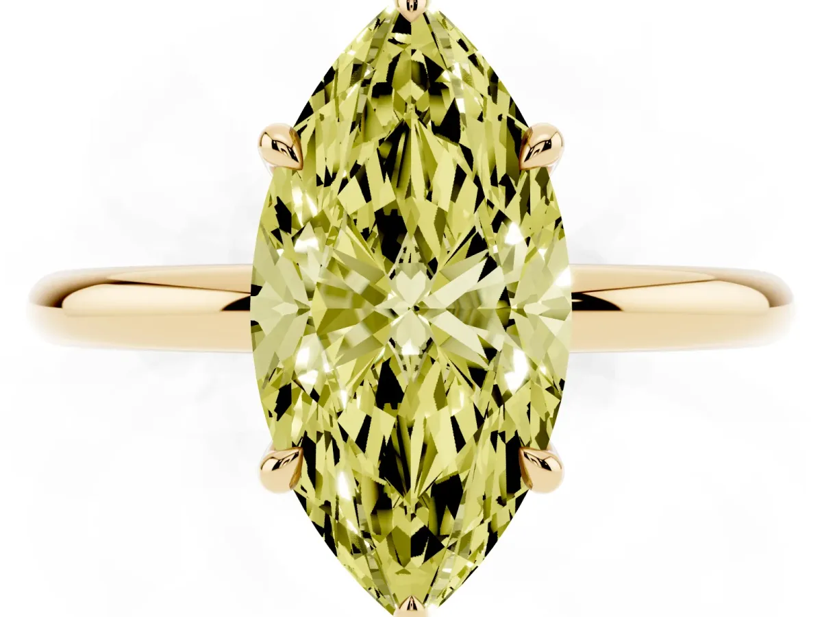 Fancy Yellow Marquise Cut Diamond Solitaire Ring with Thin Band and Four-Prong Setting Yellow gold