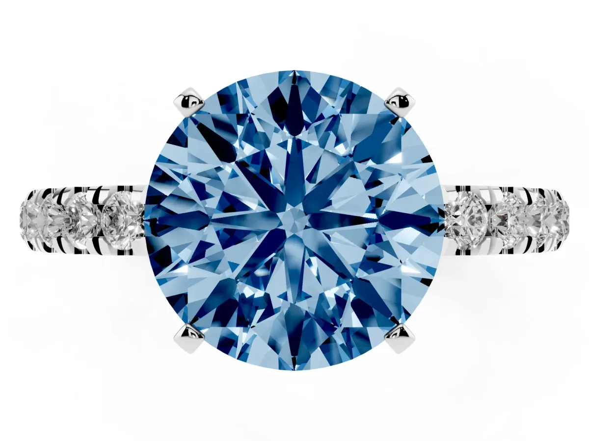 Fancy Blue Round Cut Diamond Solitaire Ring with Pavé Accents and Four-Prong Setting Platinum