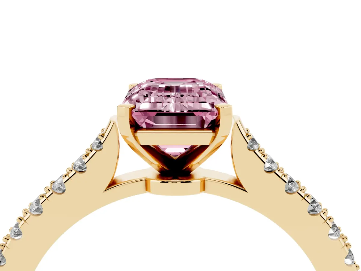 Fancy Pink Emerald Cut Cut Solitaire Diamond Engagement Ring with Pave Band and Four-Prong Setting Yellow gold