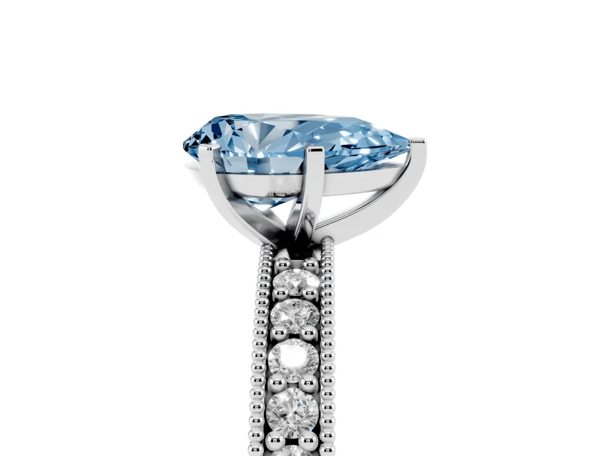 Fancy Blue Pear Cut Diamond Milgrain Pavé Engagement Ring with Four-Prong Setting Platinum