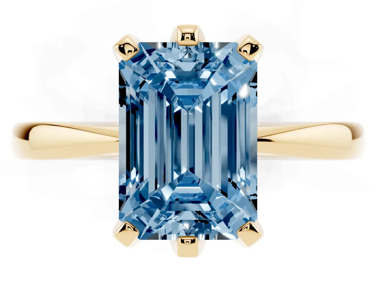 Fancy Blue Emerald Cut Solitaire Engagement Ring with Six-Prong Setting and Tapered Band Yellow gold