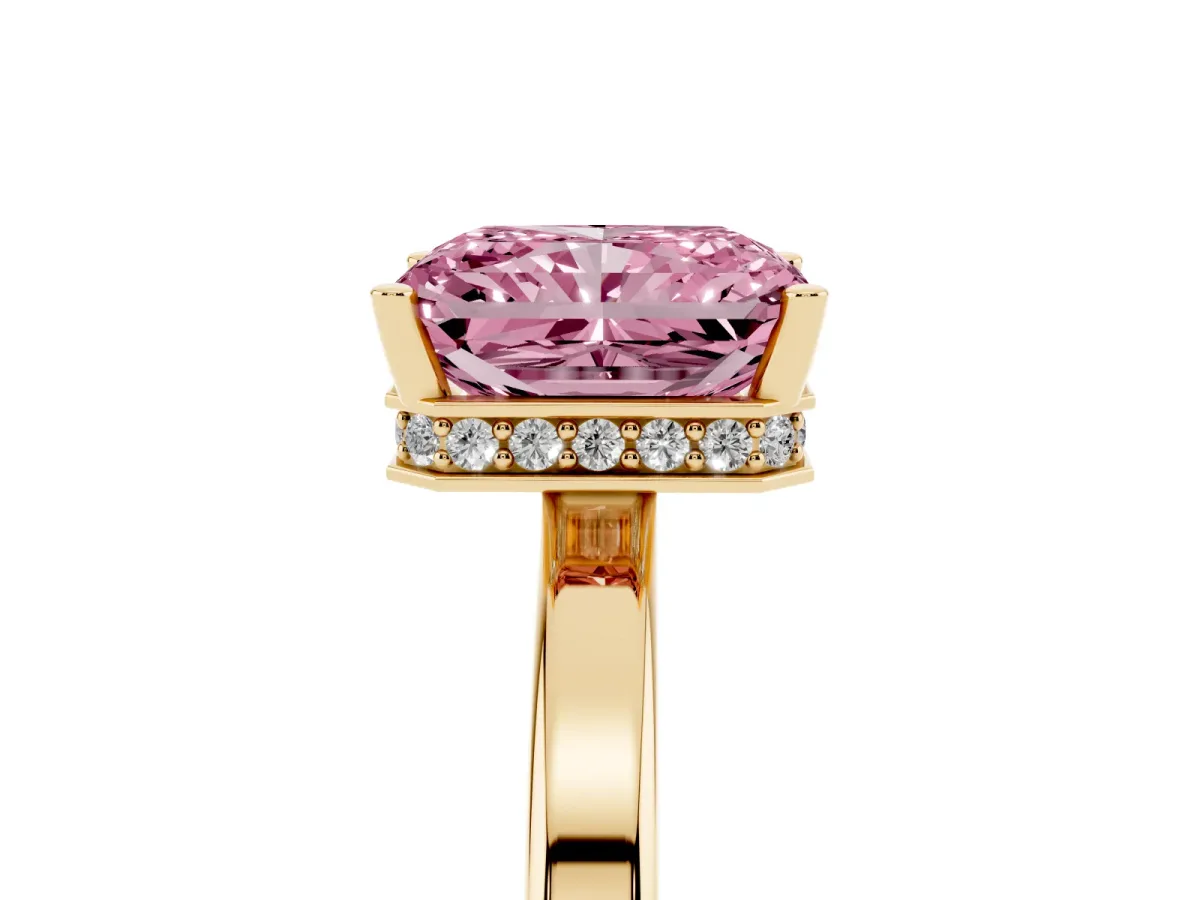 Fancy Pink Radiant Cut Cut Solitaire Engagement Ring with Four-Prong Setting on a Classic Band Yellow gold