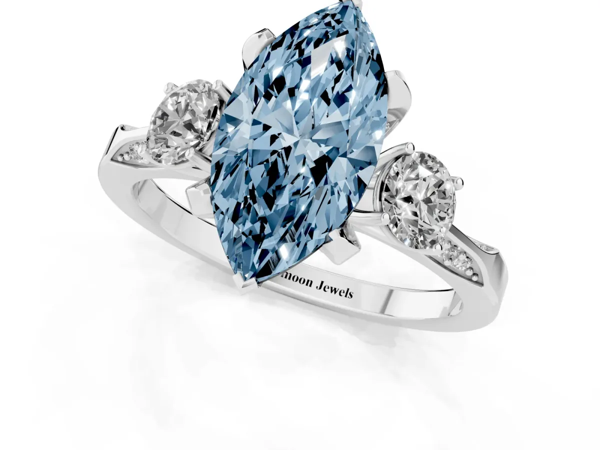 Fancy Blue Marquise Cut Brilliant Three-Stone Diamond Ring with Pavé Band and Four-Prong Setting Silver