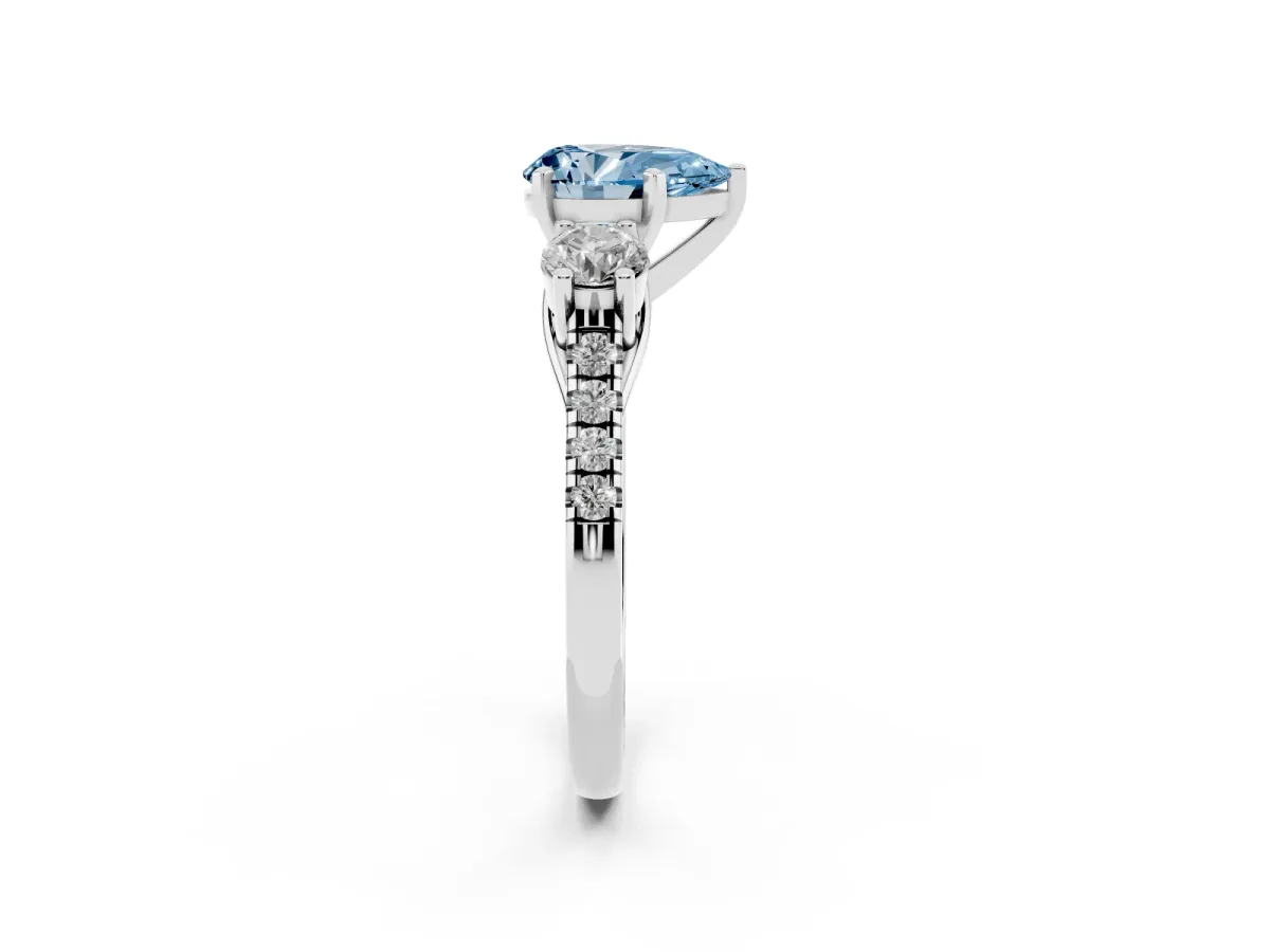 Fancy Blue Three-Stone Pear Cut Diamond Pavé Band with Four-Prong Setting Platinum