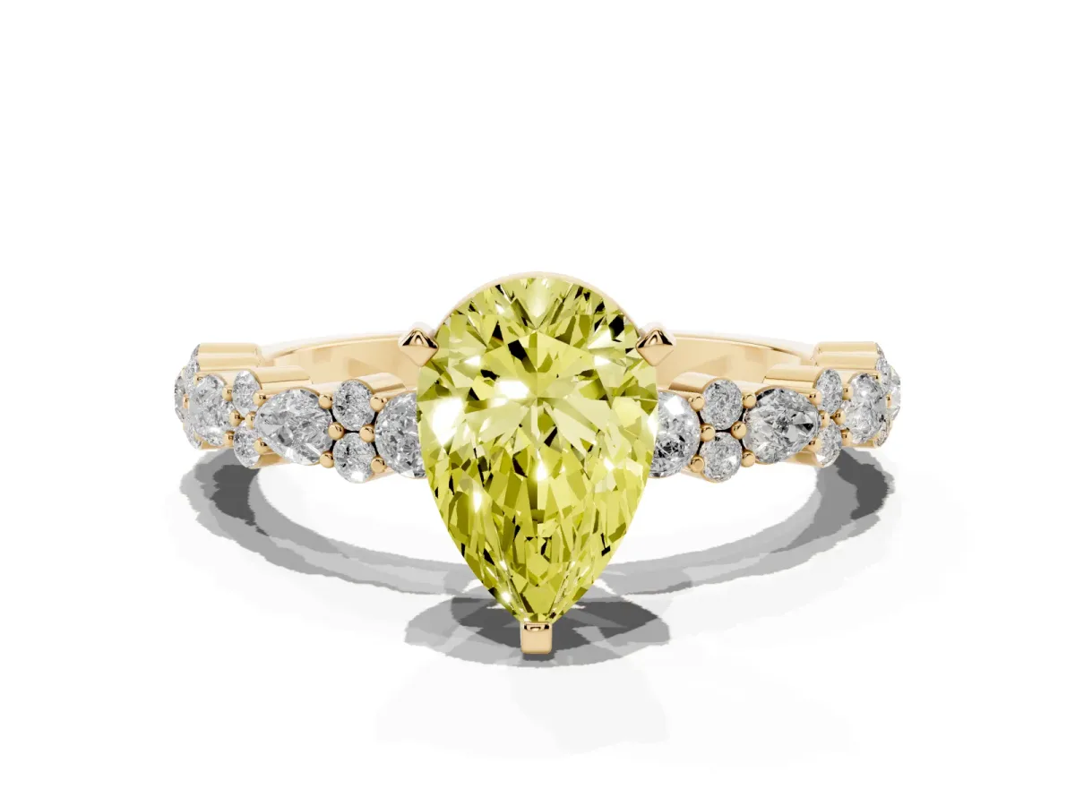 Fancy Yellow Pear Cut Diamond Side Stone Solitaire Ring with Round and Four-Prong Setting Yellow gold