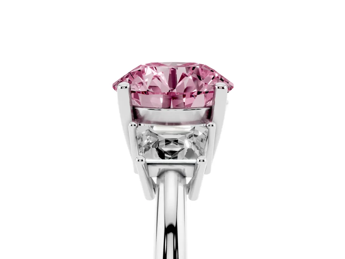 Fancy Pink Round Cut Diamond Three-Stone Ring with Trapezoid Side Stones and Prong Setting Platinum